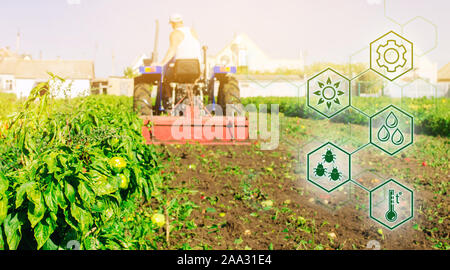 Hohe Technologien und Innovationen in der Agroindustrie. Landwirtschaftliche startup. Innovation. Automatisierung und Verbesserung der Qualität des Ernteguts. Traktor pflegt die Stockfoto