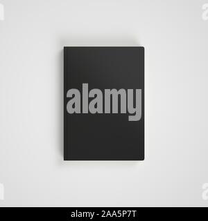 Leere schwarze Buch auf weißem Hintergrund. Easy Cover mockup. Vorderansicht. Stockfoto