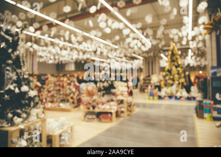 Abstract blur Bild der Shopping Mall auf Weihnachten Zeit für Hintergrund. Vintage tone Stockfoto