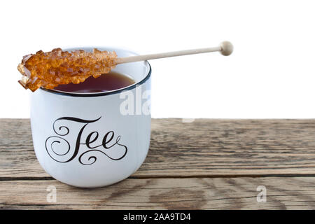 Deutsch: Kaffee und Sahne mit Süßigkeiten Stockfoto