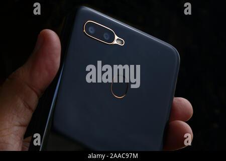 Photo of dual lens camera and fingerprint scanner at the back of a smartphone Stockfoto