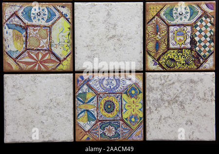 Bunte traditionelle Fliesen in verschiedenen Farben und Mustern. Stockfoto