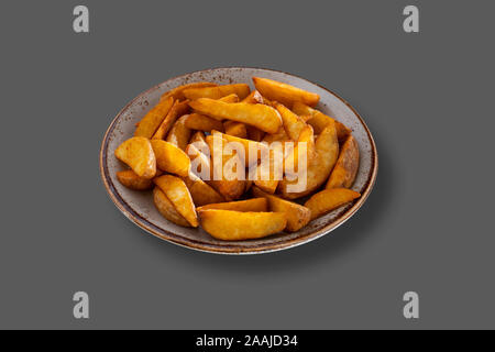 Leckere klassische gebackene Bratkartoffeln mit Vintage Style palte Stockfoto