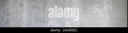 Blick auf die Struktur der glatten grauen Betonwand für den Hintergrund Stockfoto