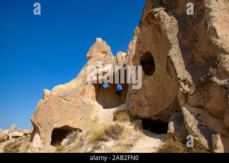 Höhle Häuser in Stein gemeißelt in Göreme, Kappadokien, Türkei Stockfoto