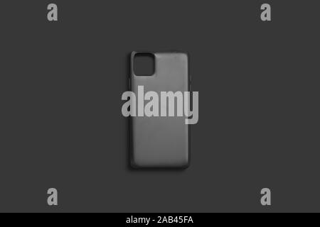 Blanke schwarze Handyhülle, oben, dunkler Hintergrund Stockfoto