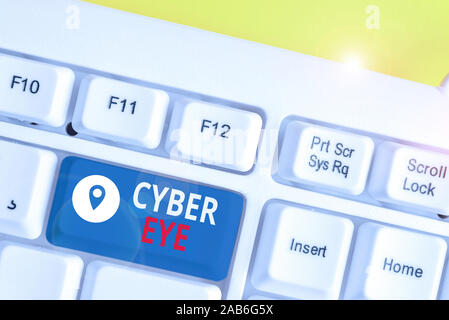 Handschrift text Cyber Auge. Konzeptionelle foto Werkzeug rückt in Gebäude smart Technologies in der cybersicherheit Weiß pc-Tastatur mit leeren Papier abov Stockfoto