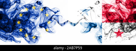 Eu, Europäische Union vs Panama smoky mystic Flaggen nebeneinander gestellt. Dicke farbige seidig abstrakt Rauch flags Kombination Stockfoto