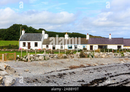 Steiniger Strand in Moelfre, Anglesey, Wales Stockfoto