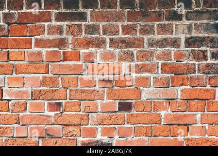 Full-frame in der Nähe der alten Ziegel stein Wand Hintergrund. Stockfoto