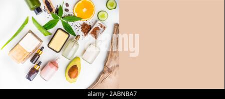 Natürliche eco Skin Care Produkte, Ansicht von oben Zutaten. Kosmetische, Masken, Seife, Blatt, Aloe vera, Avocado, Serum, Hyaluronsäure. Gesichtsbehandlung Stockfoto