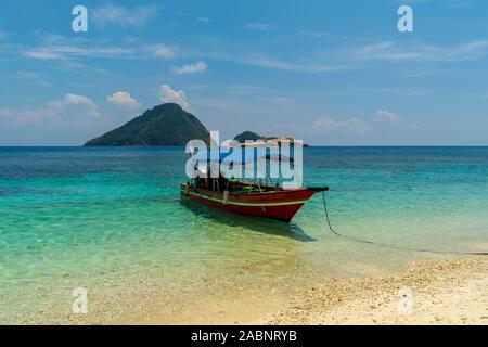 Rawa Island, Perhentian Islands, Malaysia; 18-Mai-2019; das Boot und das Meer Stockfoto