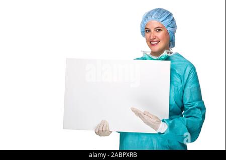 Arzt, Ärztin, OP-Schwester, mit weisser Tafel, Stockfoto