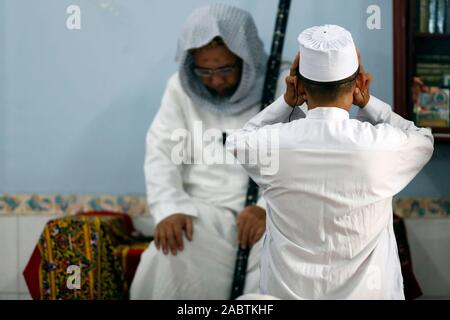 Cholon Jamail erzählt Moschee. Der freitag Gebet (jummah). Muezzin zum Gebet. Ho Chi Minh City. Vietnam. Stockfoto