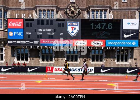 High School Jungen 4 x 400 Läufer 2019 Penn Relais konkurrieren. Stockfoto