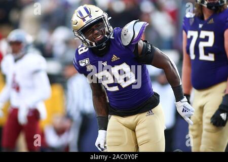 November 29, 2019: Washington Schlittenhunde zurück laufen Richard Newton (28) feiert während eines Spiels zwischen die Washington State Cougars und Washington Schlittenhunde Husky Stadium in Seattle, WA für die 112 Apple Schale. Die Schlittenhunde gewann 31-13 ihre 7. gerade Apple Cup zu gewinnen. Sean Brown/CSM Stockfoto