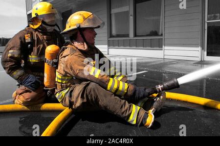 Feuerwehrleute an erfahrenem Service! Stockfoto