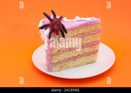 Halloween schwamm Layer Cake - orange Hintergrund Stockfoto