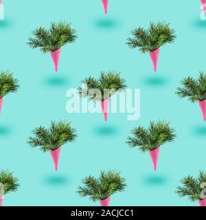Moderne Weihnachten nahtlose Textur mit lackiert rosa Eis mit flauschigen Tannenzweigen schweben. Stockfoto