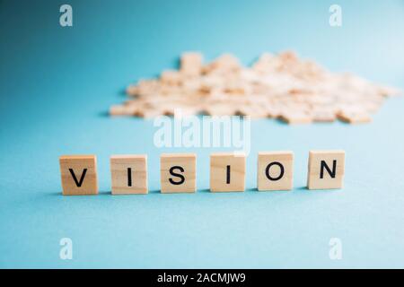 Wort der Vision, in der das Kreuzworträtsel mit Holzwürfeln gesammelt, wählen Sie die konzentrieren. Business Konzept. Stockfoto