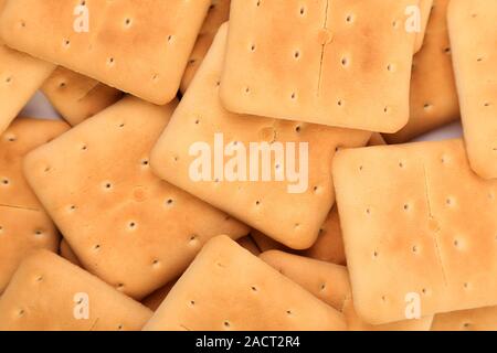 Hintergrund der Pfahl Saltine Soda Cracker. Stockfoto