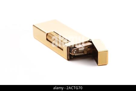 Elegante goldene Gasfeuerzeug. Stockfoto