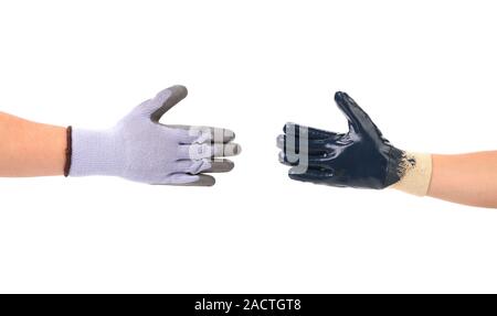 Zwei Hände Handschuhe erfüllen in der hand schütteln. Stockfoto