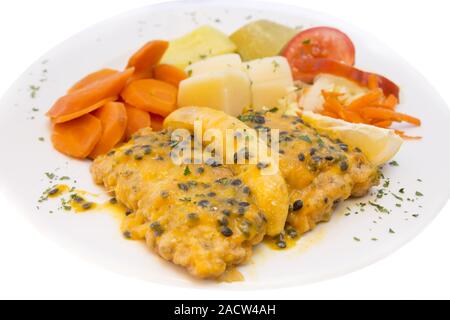 Degenfisch mit Bananen und Leidenschaft Fruchtsauce Stockfoto