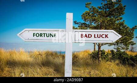 Street Sign Fortune versus Pech Stockfoto