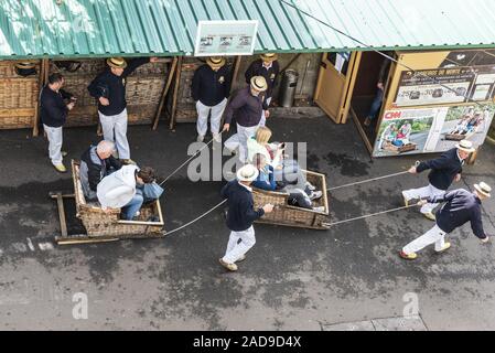 Warenkorb Schlitten Treiber, touristische Attraktion, Monte, Funchal, Madeira, Portugal, Europa Stockfoto