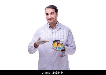 Jungen gutaussehenden Arzt mit Spritze isoliert auf weißem Stockfoto