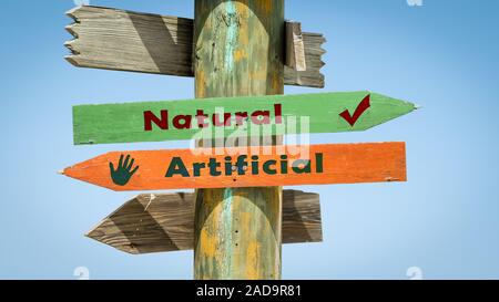 Straßenschild Künstliche versus Natürliche Stockfoto