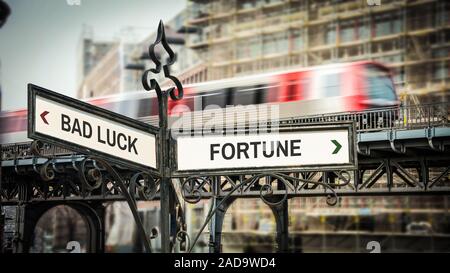 Street Sign Fortune versus Pech Stockfoto
