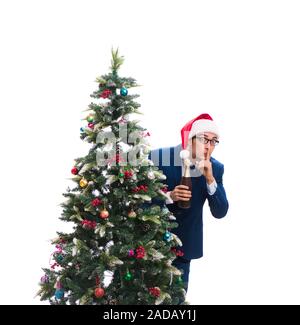 Geschäftsmann schmücken Weihnachtsbaum isoliert auf weißem Stockfoto
