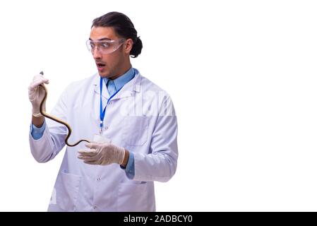 Junge männliche Zoologe mit Schlange isoliert auf weißem Stockfoto