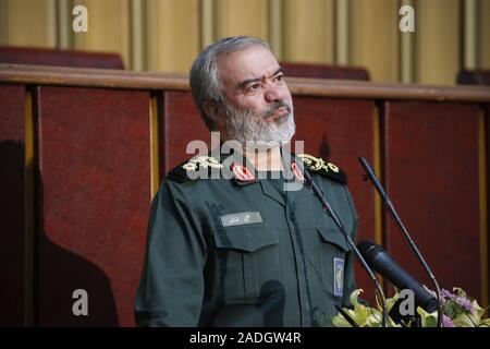 Teheran, Iran. 4. Dez, 2019. Stellvertretender Leiter der Islamischen Revolution Guards (IRGC), ALI FADAVI, spricht während einer Konferenz in Teheran, Iran. Fadavi ist ein Iranischer Kommandant und der ehemalige Befehlshaber der Marine von der Islamischen Revolutionary Guard Corps von Mai 2010 bis zum 23. August 2018. Ab 23. August 2018 ist er in die Position des IRGC stellvertretender Koordinator ernannt, Austausch Jamaladin Abromand. Im Februar 2016, Fadavi zusammen mit anderen Kommandanten der Islamischen Revolutionary Guard Corps erhielt eine Fath Medaille für das Festhalten der United States Navy Matrosen am 12. Januar 2016, im Persischen Golf. (Credit Stockfoto