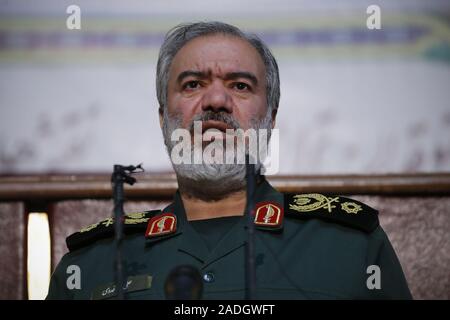 Teheran, Iran. 4. Dez, 2019. Stellvertretender Leiter der Islamischen Revolution Guards (IRGC), ALI FADAVI, spricht während einer Konferenz in Teheran, Iran. Fadavi ist ein Iranischer Kommandant und der ehemalige Befehlshaber der Marine von der Islamischen Revolutionary Guard Corps von Mai 2010 bis zum 23. August 2018. Ab 23. August 2018 ist er in die Position des IRGC stellvertretender Koordinator ernannt, Austausch Jamaladin Abromand. Im Februar 2016, Fadavi zusammen mit anderen Kommandanten der Islamischen Revolutionary Guard Corps erhielt eine Fath Medaille für das Festhalten der United States Navy Matrosen am 12. Januar 2016, im Persischen Golf. (Credit Stockfoto