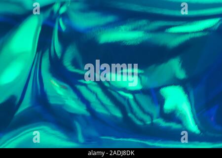 Abstrakte Minze und blaue Flüssigkeit Kunst Hintergrund. Echten holographische Metallfolie Textur mit Kratzern und Unregelmäßigkeiten. Stockfoto