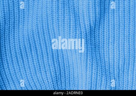 Blau Trendige im Jahr 2020 Jahr gestrickt Wollstoff strukturierten Hintergrund. Kleidung oder Gewebe für Design. Stockfoto