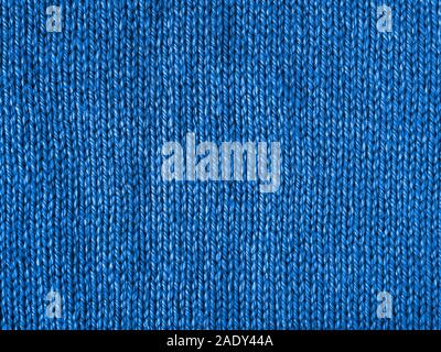 Blau gestrickt Jersey als Background. Trendy Blau als Farbe textule Konzept 2020. Kopieren Sie Platz für Text und Design. Stockfoto