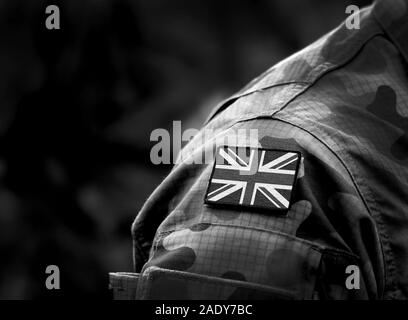 Flagge des Vereinigten Königreichs auf der Uniform. Britischen Armee. Britische Streitkräfte, Soldaten. Collage. Stockfoto