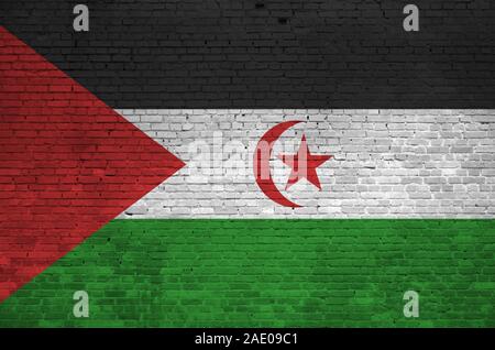 Westsahara Flagge in Farbe Farben auf alten Mauer dargestellt. Texturierte Banner auf große Mauer Mauerwerk Hintergrund Stockfoto