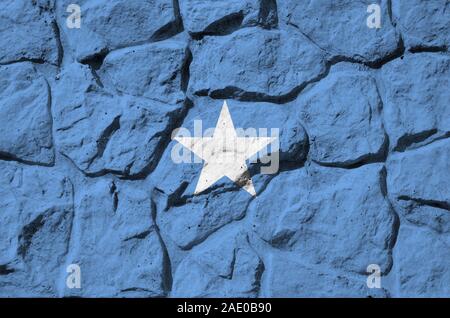 Somalia Flagge in Farbe Farben auf alten Steinmauer dargestellt. Texturierte Banner auf Rock Wand Hintergrund Stockfoto