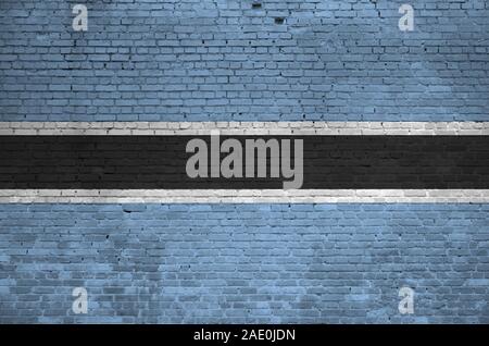 Botswana Fahne in Farbe Farben auf alten Mauer dargestellt. Texturierte Banner auf große Mauer Mauerwerk Hintergrund Stockfoto