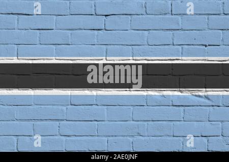 Botswana Fahne in Farbe Farben auf alten Mauer dargestellt. Texturierte Banner auf große Mauer Mauerwerk Hintergrund Stockfoto