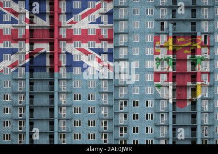 Fidschi Flagge in Farbe Farben auf multi-Geschichte residental Gebäude im Bau. Texturierte Banner auf große Mauer Hintergrund Stockfoto