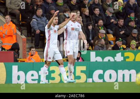 Norwich, UK. 08 Dez, 2019. George Baldock von Sheffield United (L) feiert die zweite Sheffield Utd Ziel des Spiels während der Premier League Match zwischen Norwich City und Sheffield United an der Carrow Road am 8. Dezember 2019 in Norwich, England. (Foto von Mick Kearns/phcimages.com) Credit: PHC Images/Alamy leben Nachrichten Stockfoto