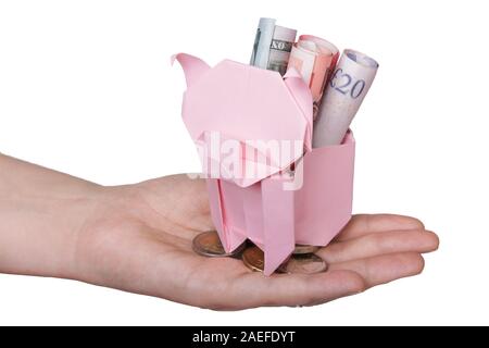 Piggy Bank suchen, um sich für die Münze isoliert auf weißem Stockfoto
