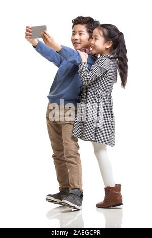 Glückliche Kinder unter selfie Stockfoto