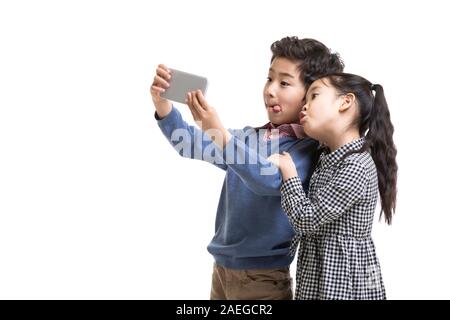 Glückliche Kinder unter selfie Stockfoto